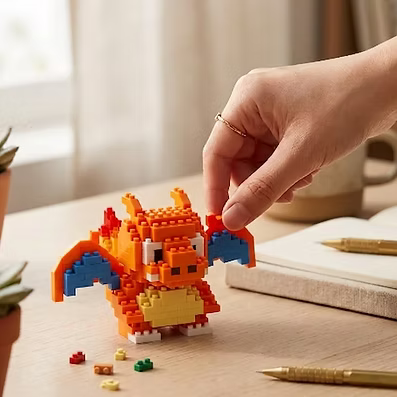 Charizard Pop Bricks mini figure being placed on a desk